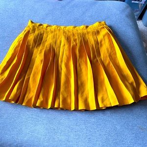 mustard pleated mini skirt